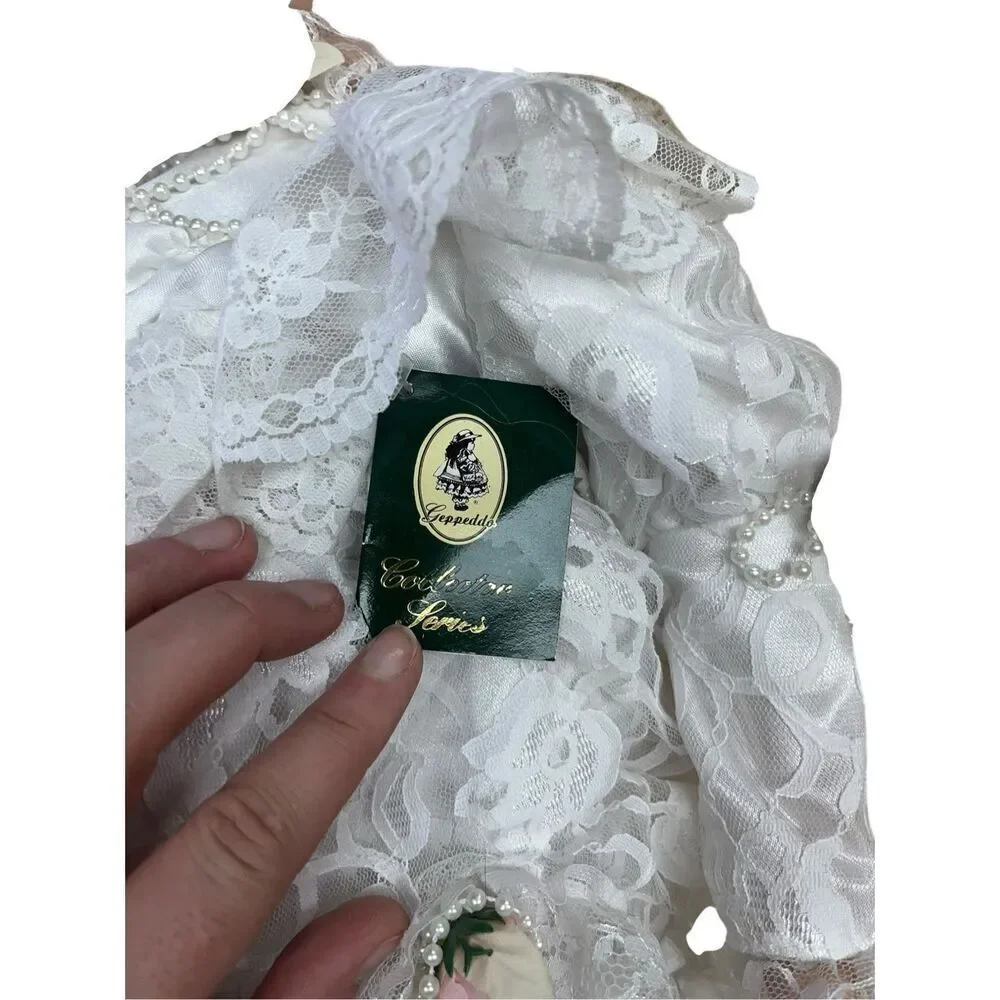 Gepetto’s  porcelain doll 18 inches